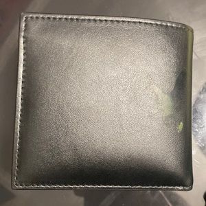 leather wallet (damaged)